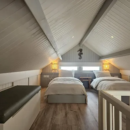 Skip Strandhuisjes Hébergement de vacances *