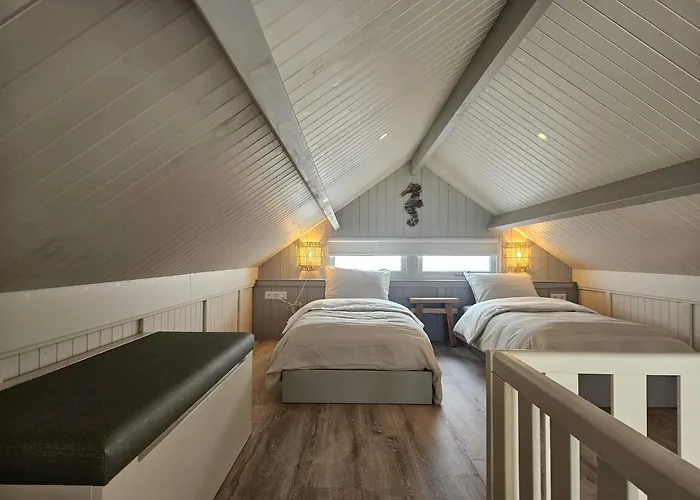 Skip Strandhuisjes Hébergement de vacances *